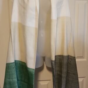 Floor 9 scarf wrap green, grey, cream, and beige.